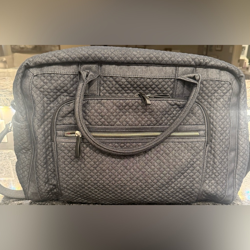 Quilted dark blue denim Vera Bradley travel bag